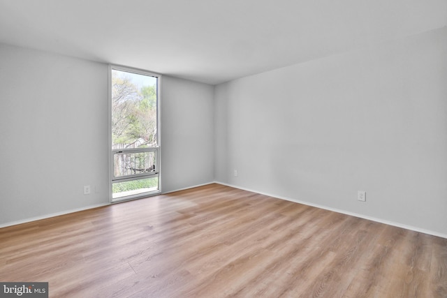 1602 Chimney House Rd Unit 1602, Reston, VA 20190 - spare room with wood finished floors and baseboards