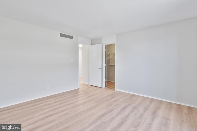 1602 Chimney House Rd Unit 1602, Reston, VA 20190 - spare room with light wood-style flooring and baseboards