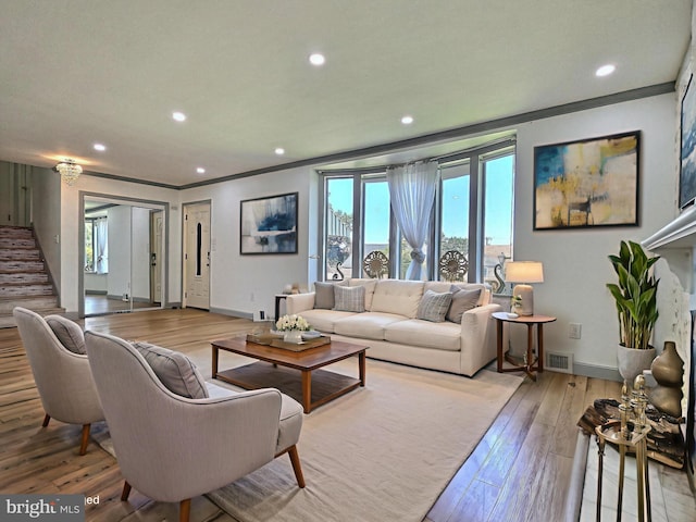 1927 N 15th St, Reading, PA 19604 - living room featuring baseboards, wood-type flooring, plenty of natural light, recessed lighting, and crown molding