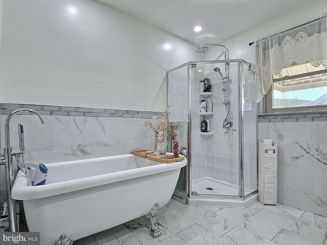 1927 N 15th St, Reading, PA 19604 - full bath featuring tile walls, marble finish floors, a soaking tub, and a shower stall