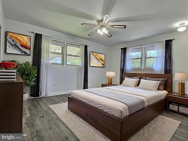 1927 N 15th St, Reading, PA 19604 - bedroom featuring wood finished floors, a ceiling fan, and baseboards
