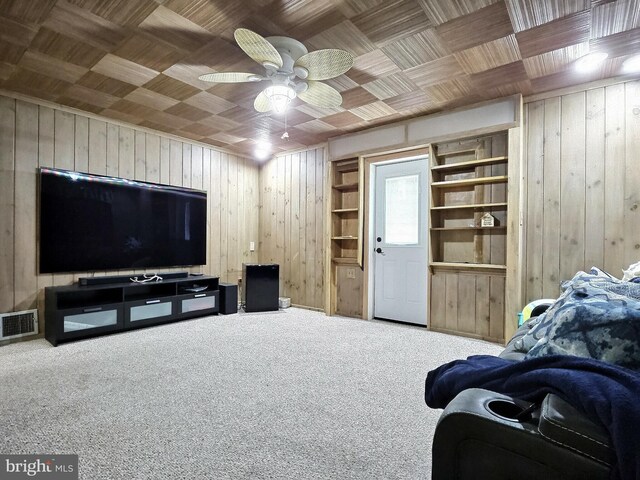 1927 N 15th St, Reading, PA 19604 - carpeted living area with wood walls and ceiling fan