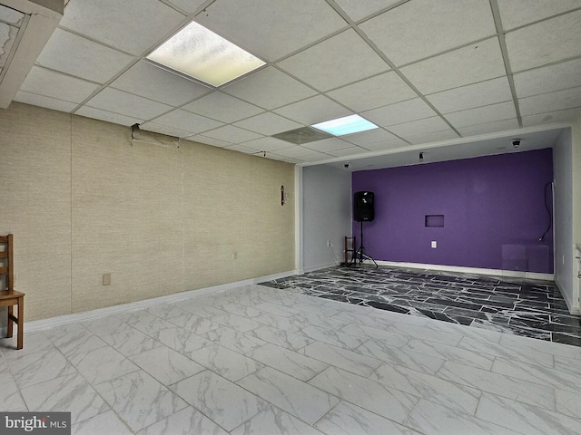 1927 N 15th St, Reading, PA 19604 - unfurnished room featuring a paneled ceiling, baseboards, and marble look tile flooring