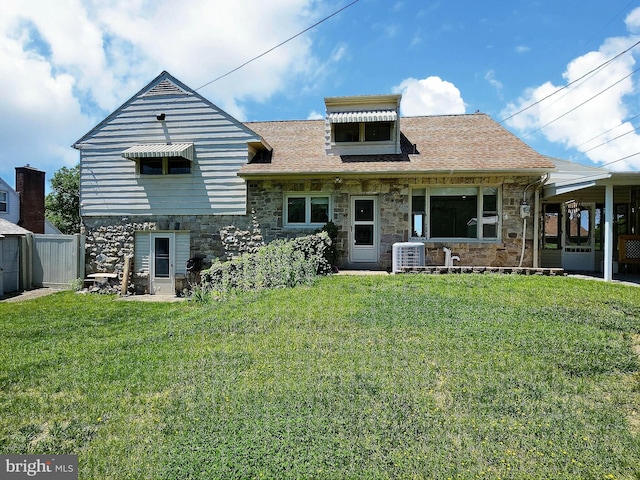 1927 N 15th St, Reading, PA 19604 - back of property featuring stone siding, a yard, and central AC