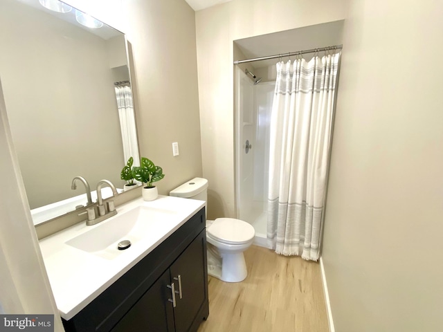 6 Kent Pl, Sewell, NJ 08080 - full bath with vanity, wood finished floors, toilet, and curtained shower