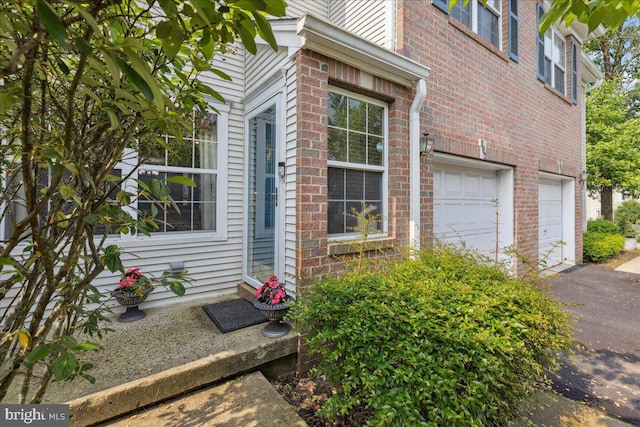 302 Berkshire, Princeton, NJ 08540 - property entrance featuring brick siding, driveway, and a garage