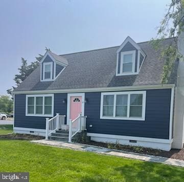 65 W W Ave W, Ocean View, DE 19970 - cape cod house with crawl space and a front lawn