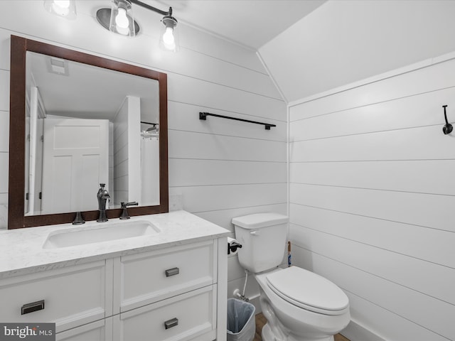 65 W W Ave W, Ocean View, DE 19970 - full bathroom featuring vanity, lofted ceiling, a shower with shower curtain, and wooden walls