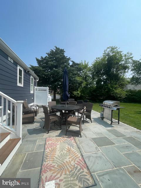 65 W W Ave W, Ocean View, DE 19970 - view of patio with outdoor dining space and area for grilling