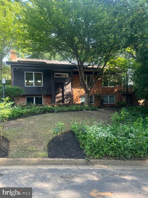 4834 8th St S, Arlington, VA 22204 - bi-level home featuring a chimney