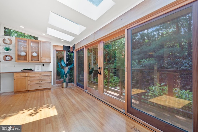 4834 8th St S, Arlington, VA 22204 - unfurnished sunroom featuring a skylight, lofted ceiling, healthy amount of natural light, and french doors