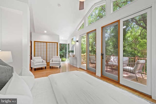 4834 8th St S, Arlington, VA 22204 - bedroom with access to exterior, multiple windows, wood finished floors, and high vaulted ceiling