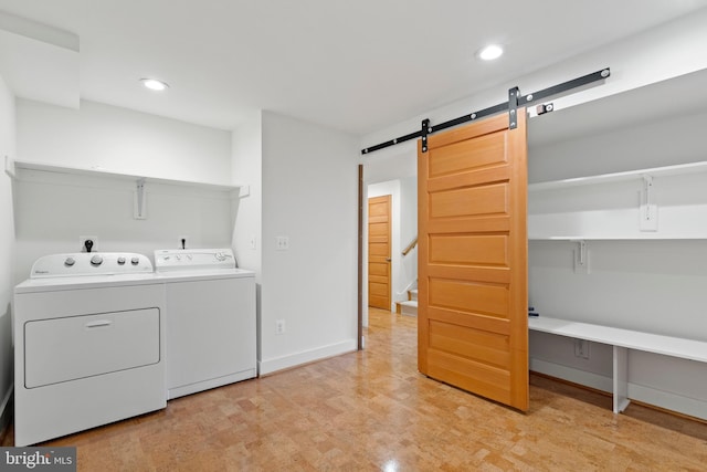 4834 8th St S, Arlington, VA 22204 - laundry room featuring washer and dryer, a barn door, recessed lighting, and baseboards