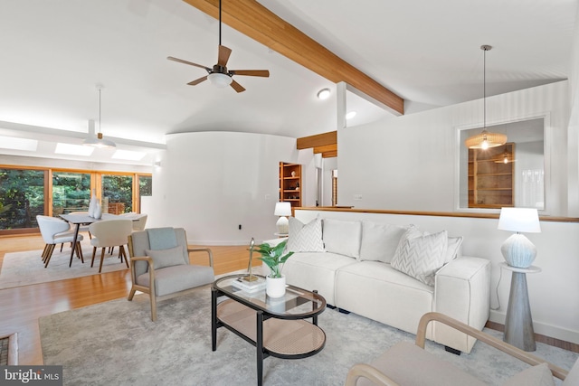 4834 8th St S, Arlington, VA 22204 - living area featuring light wood-style flooring, a ceiling fan, and baseboards