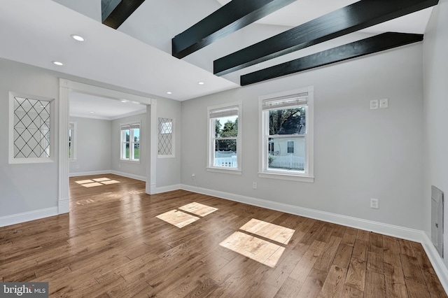 501 Clays Ln, Laurel, MD 20707 - unfurnished living room with plenty of natural light, baseboards, wood finished floors, recessed lighting, and beam ceiling