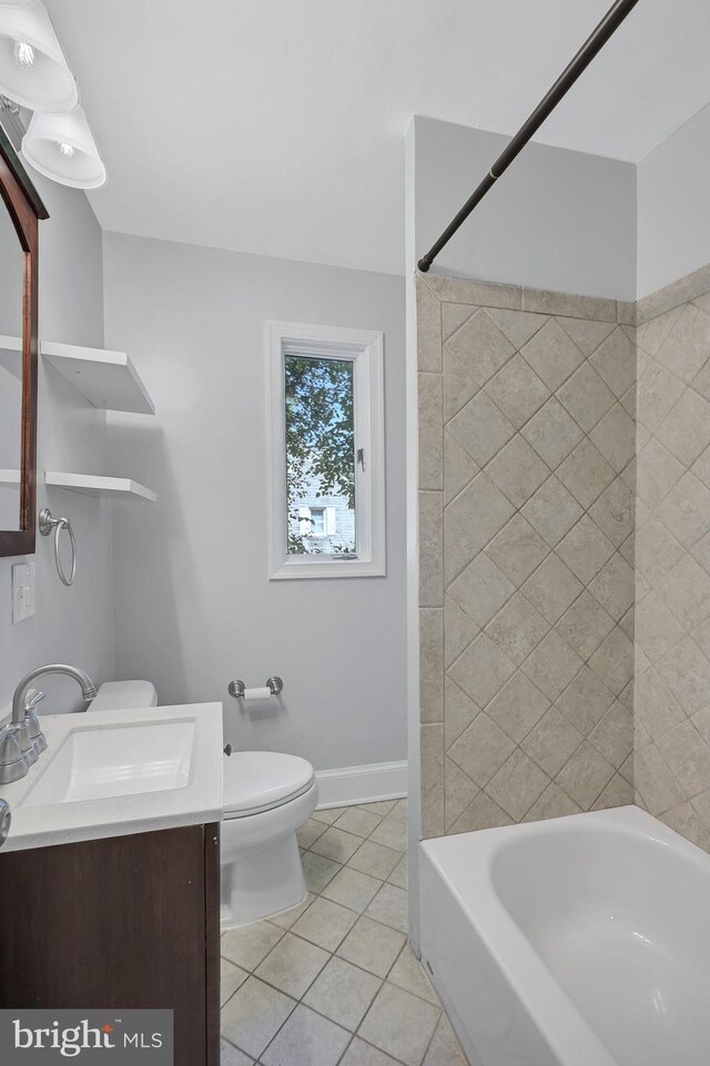 501 Clays Ln, Laurel, MD 20707 - bathroom featuring vanity, tile patterned flooring, toilet, shower / bathtub combination, and baseboards