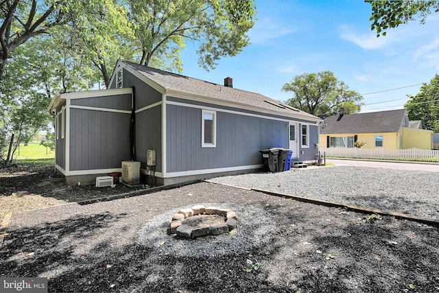 501 Clays Ln, Laurel, MD 20707 - back of property with a fire pit and a chimney