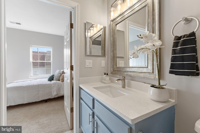 8311 Cloud St, Laurel, MD 20724 - bathroom featuring vanity, connected bathroom, and toilet