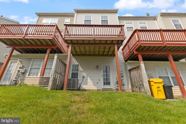 8311 Cloud St, Laurel, MD 20724 - rear view of house featuring a yard, a deck, and cooling unit