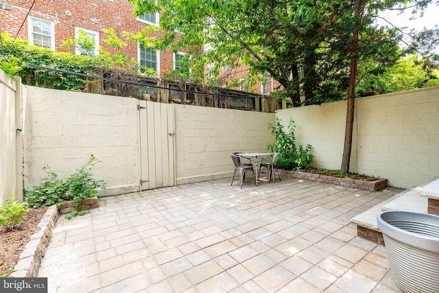 2112 Pine St Unit 2, Philadelphia, PA 19103 - fenced backyard featuring a patio area, outdoor dining space, and a gate
