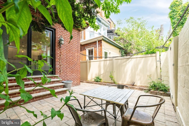 2112 Pine St Unit 2, Philadelphia, PA 19103 - fenced backyard with a patio and outdoor dining area