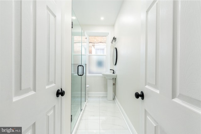 2112 Pine St Unit 2, Philadelphia, PA 19103 - full bath featuring marble finish flooring, a shower stall, baseboards, toilet, and a sink