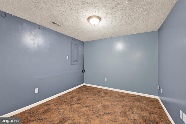 6119 Starburn Path, Columbia, MD 21045 - spare room with a textured ceiling and baseboards