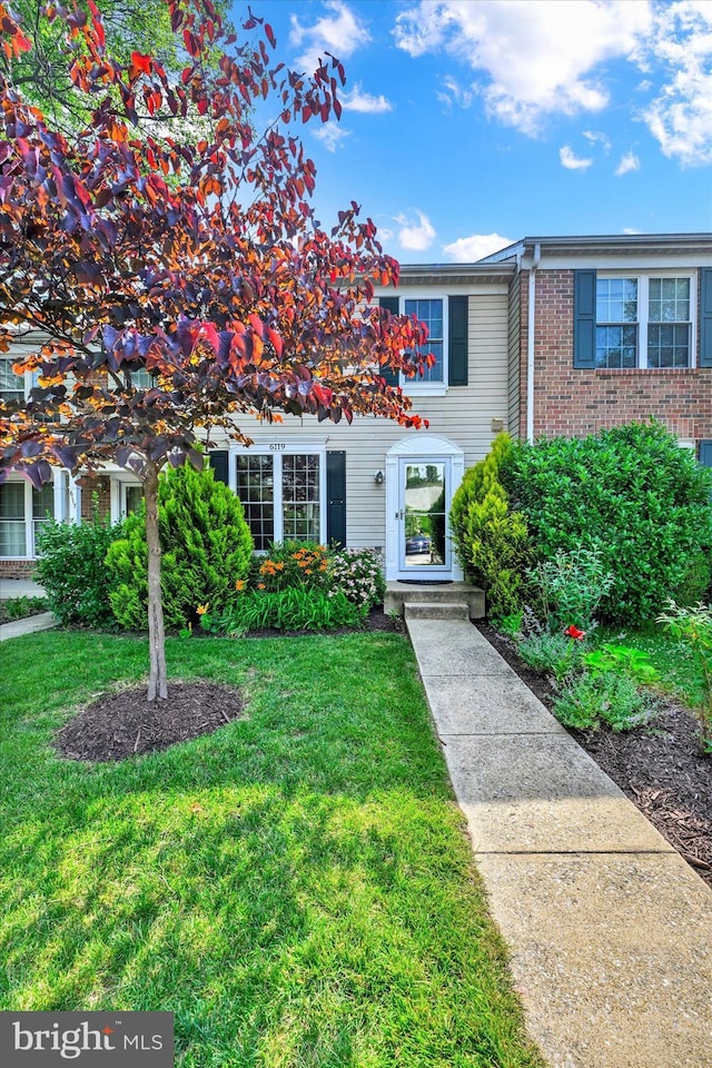 6119 Starburn Path, Columbia, MD 21045 - multi unit property with a front yard and brick siding