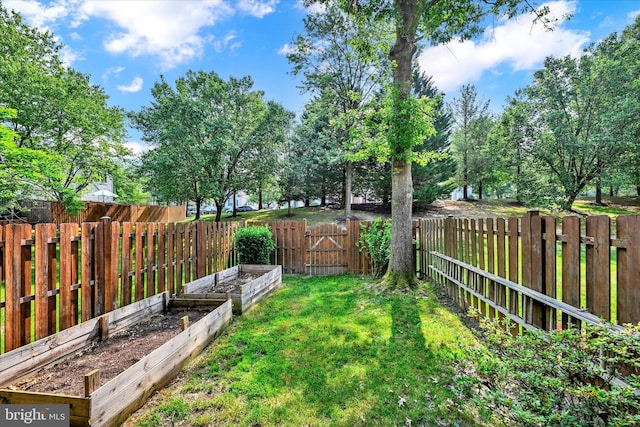 6119 Starburn Path, Columbia, MD 21045 - fenced backyard featuring a garden
