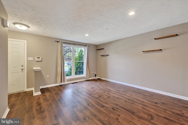 6119 Starburn Path, Columbia, MD 21045 - unfurnished room featuring a textured ceiling, wood finished floors, and recessed lighting