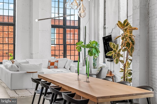 1220 Bank St Unit 304, Baltimore, MD 21202 - lobby featuring brick wall and a towering ceiling