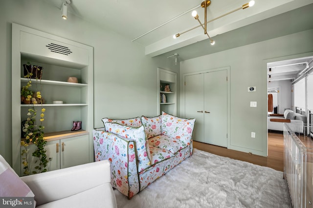 1220 Bank St Unit 304, Baltimore, MD 21202 - bedroom featuring a closet and wood finished floors