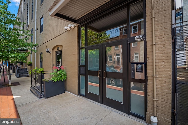 1220 Bank St Unit 304, Baltimore, MD 21202 - property entrance featuring french doors and a surveillance system