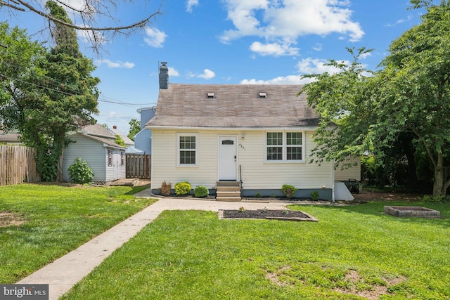 7821 Wendover Ave, Baltimore, MD 21234 - view of front of house featuring a chimney, entry steps, and an outdoor structure