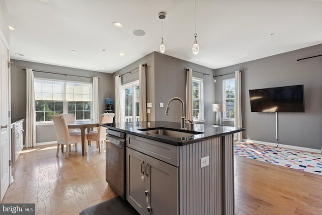 2316 Macis Cir, Warrington, PA 18976 - kitchen featuring stainless steel dishwasher, a sink, dark countertops, light wood-type flooring, and recessed lighting