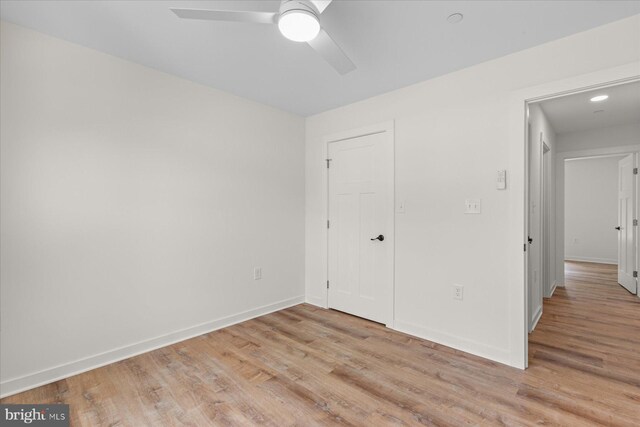 209 S Camden Ave, Fruitland, MD 21826 - unfurnished bedroom featuring light wood finished floors, a ceiling fan, and a closet