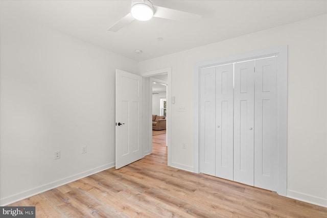 209 S Camden Ave, Fruitland, MD 21826 - unfurnished bedroom with light wood-style floors, a closet, and ceiling fan