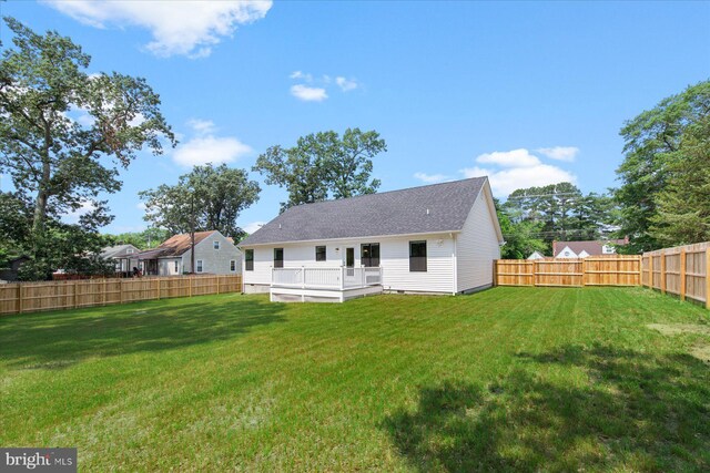 209 S Camden Ave, Fruitland, MD 21826 - rear view of house featuring a fenced backyard and roof with shingles
