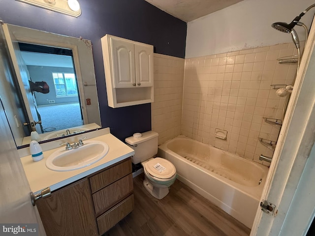 87 Puffin Glade, Bayville, NJ 08721 - bathroom featuring toilet, wood finished floors, vanity, and shower / bathtub combination