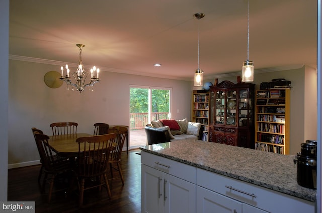 6403 Limerick Ct, Springfield, VA 22152 - kitchen featuring crown molding, a chandelier, white cabinets, light stone counters, and dark wood-type flooring
