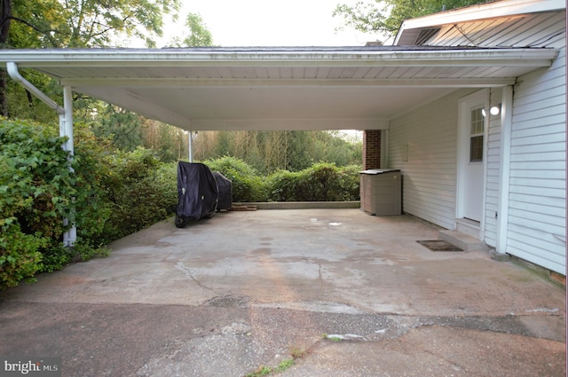6403 Limerick Ct, Springfield, VA 22152 - view of parking with an attached carport and driveway