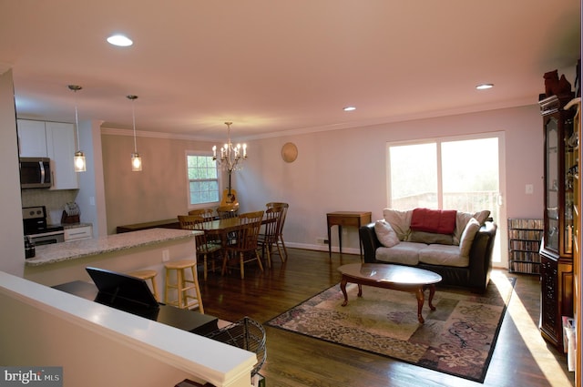 6403 Limerick Ct, Springfield, VA 22152 - living area with a chandelier, dark wood-style flooring, ornamental molding, recessed lighting, and baseboards