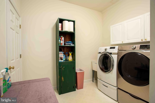 1688 W Commonwealth Dr, Front Royal, VA 22630 - laundry area featuring separate washer and dryer, cabinet space, light flooring, and baseboards