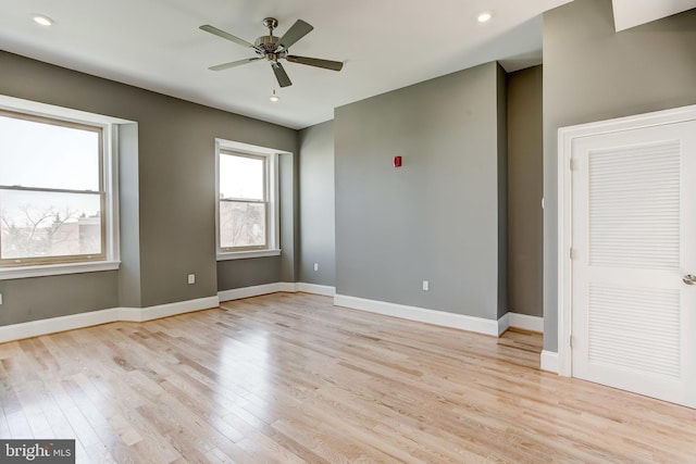 1214 Eutaw Pl, Baltimore, MD 21217 - empty room with light wood finished floors, a ceiling fan, baseboards, and recessed lighting