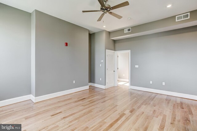 1214 Eutaw Pl, Baltimore, MD 21217 - empty room with light wood-style flooring, ceiling fan, baseboards, and recessed lighting