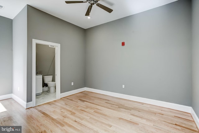 1214 Eutaw Pl, Baltimore, MD 21217 - unfurnished room featuring ceiling fan, light wood-style floors, and baseboards