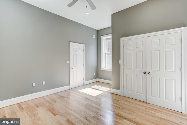 1214 Eutaw Pl, Baltimore, MD 21217 - unfurnished bedroom featuring wood finished floors, baseboards, a closet, and a ceiling fan