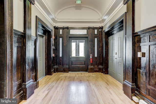 1214 Eutaw Pl, Baltimore, MD 21217 - entryway featuring ornamental molding, light wood finished floors, and lofted ceiling