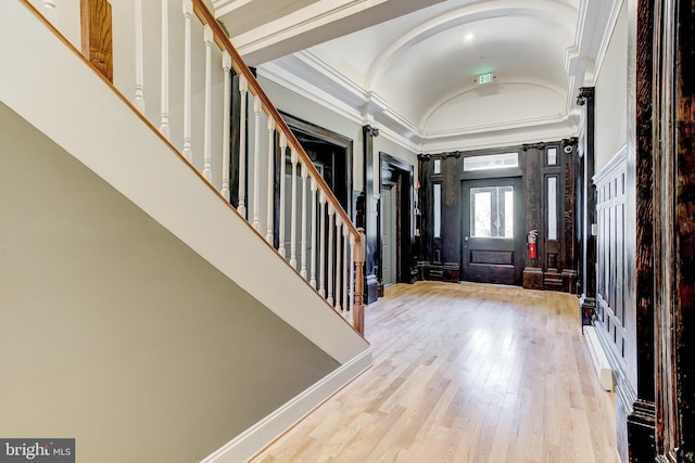 1214 Eutaw Pl, Baltimore, MD 21217 - foyer entrance with vaulted ceiling, wood finished floors, and stairs