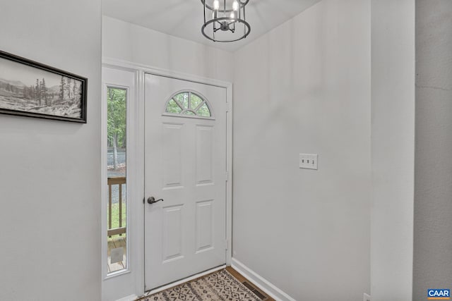 7 Sand Trap Ter, Palmyra, VA 22963 - foyer featuring a chandelier and wood finished floors